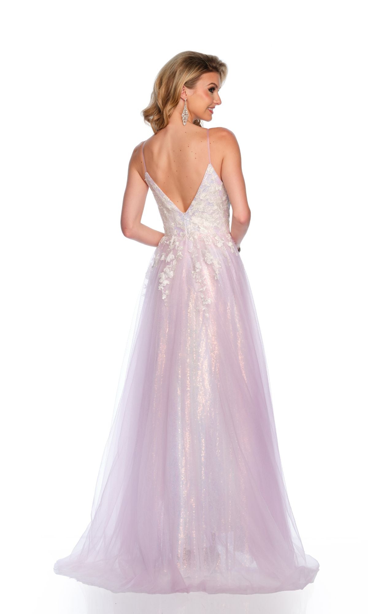 A woman faces away wearing the Long Formal Dress 11585 by Dave and Johnny—a sleeveless, light purple tulle A-line gown with floral details, lace embroidery, and a deep V-back.